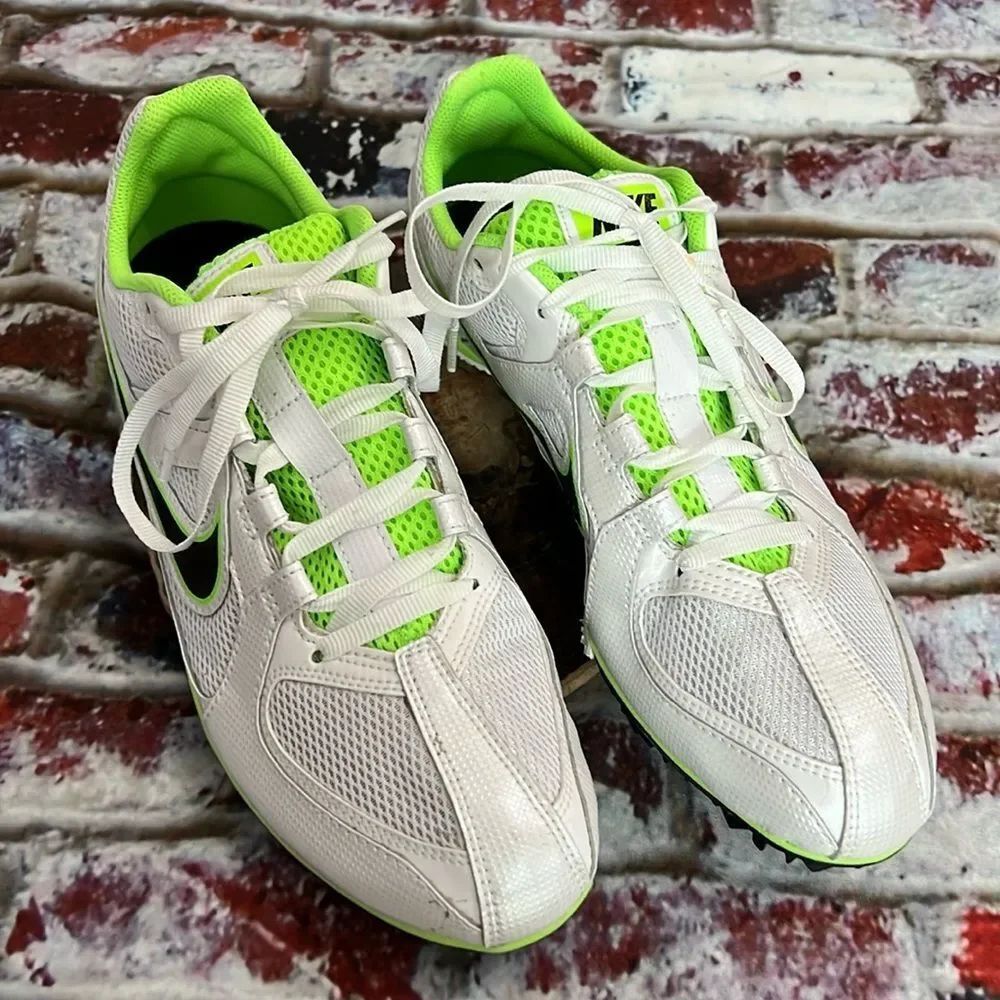 * White green Nike track and field shoes
